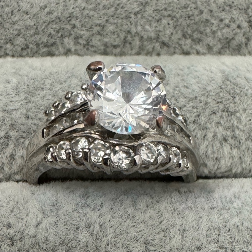 Elegant Silvertone Faux Diamond Ring with Clear Stones